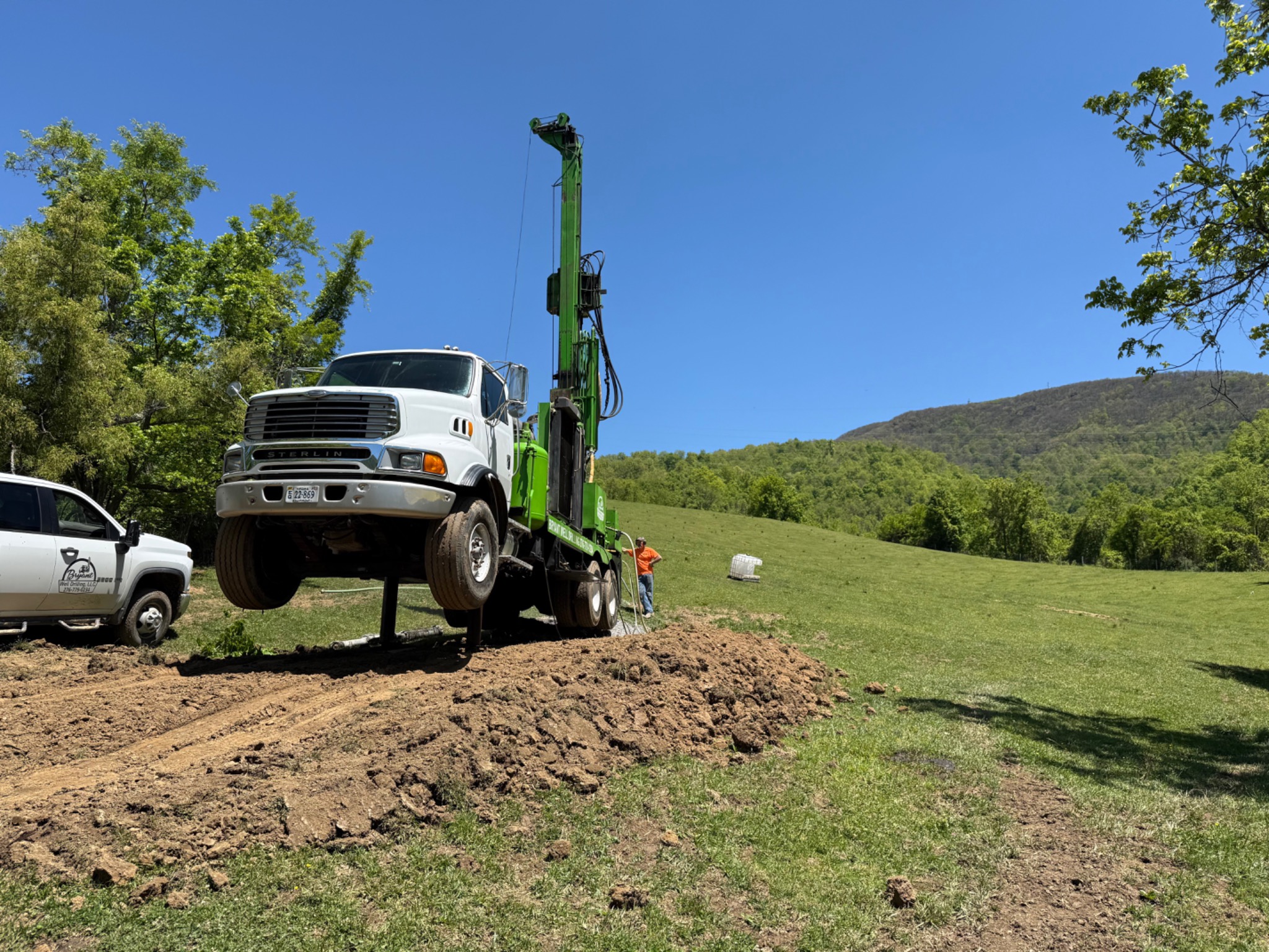 Bryant Well Drilling rig set up at a rural property
